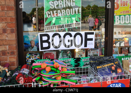 BOGOF sign in shop window Stock Photo