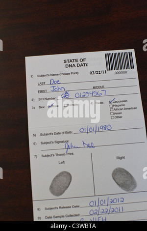 DNA data collection card with suspect fingerprints at Texas Department of Public Safety crime laboratory in Austin Stock Photo