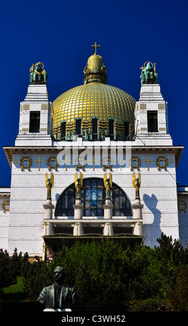 art deco church in vienna with golden cuppola in front of blue sky Stock Photo