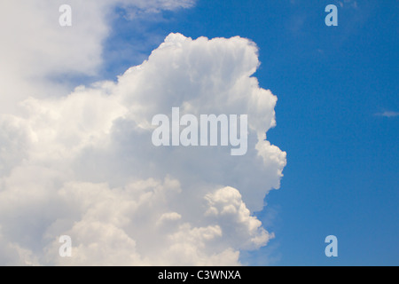 Big puffy white cloud on blue sky Stock Photo