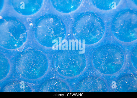 Blue bubble texture from pool cover in Portugal Stock Photo