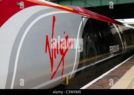 Travelling Virgin Voyager Pendolino Passenger Trains at Lancaster, Lancashire, UK Stock Photo