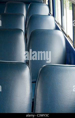 seats in a old bus for background Stock Photo