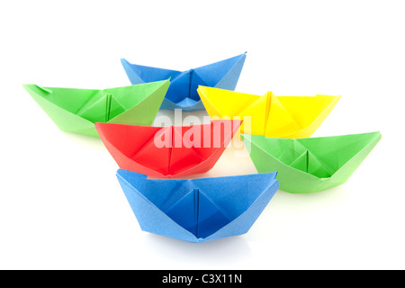 many colorful folded paper boats on white background Stock Photo