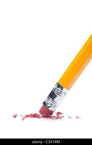 A pencil eraser removing a written mistake on a piece of paper. Stock Photo