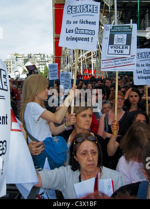 Paris, France, Crowd of French WOmen, at Feminist Demonstration, Against Sexism in 'Dominique Strauss Kahn' Case, Holding Protest Signs on Street, equality, women's rights movement, young teenage french girl Stock Photo
