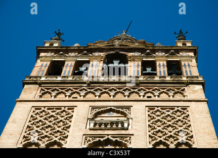 Looking up at the bells in the Giralda tower in Seville, Spain Stock Photo