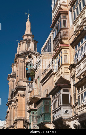 Church of St Paul's Shipwreck and traditional balconies Valletta Malta Stock Photo