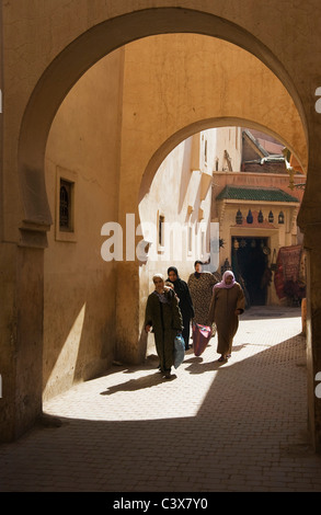 Arcade and alley in the Medina (the original Arab part of a town) of Marrakesh, Morocco. No model release. Stock Photo