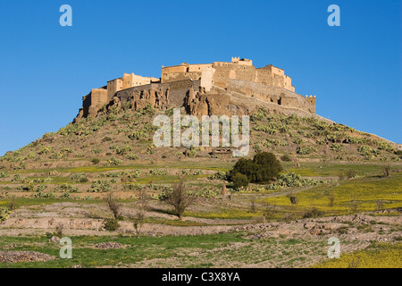 The spectacularly sited agadir (fortified granary) of Tizourgane in the Anti-Atlas mountains, Morocco- Stock Photo