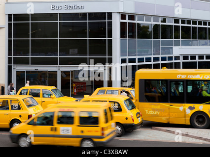 derby bus station with yellow taxi cabs and buses on a busy day city centre derby derbyshire england uk gb eu europe Stock Photo