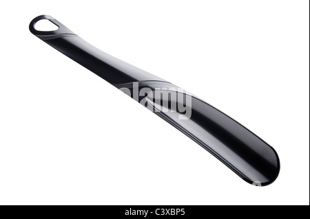 object on white - plastic shoehorn close up Stock Photo - Alamy