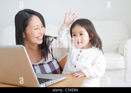Mother and Daughter with Laptop Stock Photo
