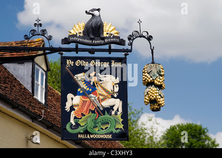 ornate traditional pub sign in rural english village