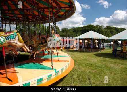 Gallopers Fairground Ride Wooden horses know as 'gallopers' on a traditional fair ground ride at ...