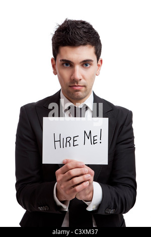 Businessman holding a cardboard with the text Hire Me, isolated on white background Stock Photo