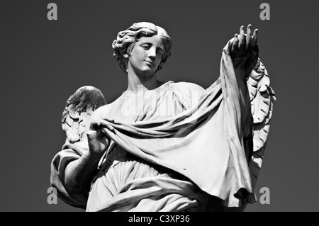 Rome, Italy- Sant Angelo Bridge stone sculpture of Angel with the Sudarium Stock Photo