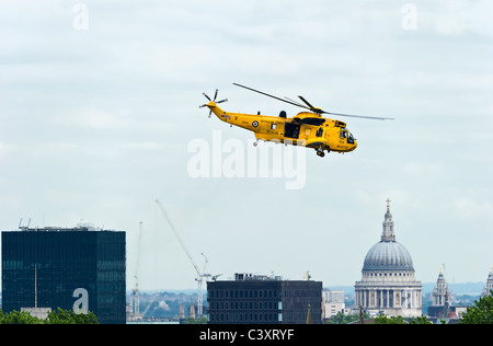 Westland Sea King HAR3A Search and Rescue helicopter from the A-flight, No. 22 Squadron RAF, taking off over London, England Stock Photo