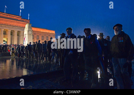 Veterans march off in the rain at the Dawn Service, War Memorial Museum, Auckland, New Zealand, Monday, April 25, 2011. Stock Photo