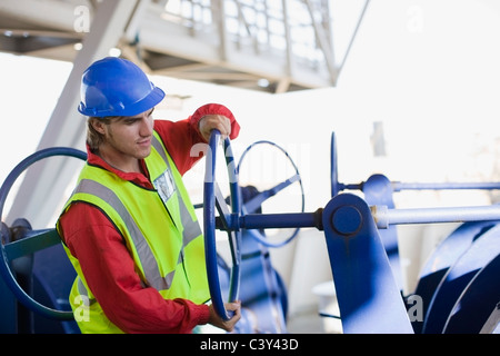 Builder doing maintenance works Stock Photo