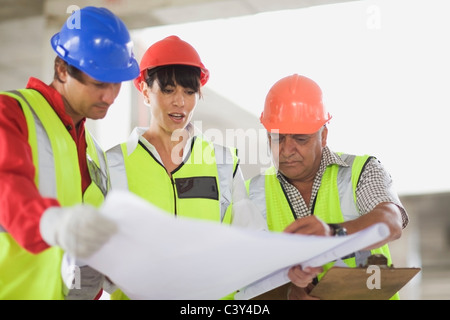Architect showing construction plans Stock Photo