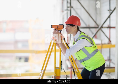 Architect doing measuring Stock Photo