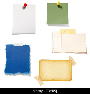 collection of various note paper with a push pin on white background ...