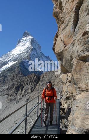 Matterhorn, Zermatt, Valais, mountain, hiker, woman, Hornli, hut, Alps, Swiss, Switzerland, blue, sky, walking, hiking, mountain Stock Photo