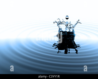 Blue abstract background with water splash and ripples Stock Photo