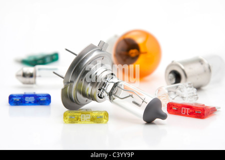 Halogen bulbs and fuses on white background Stock Photo