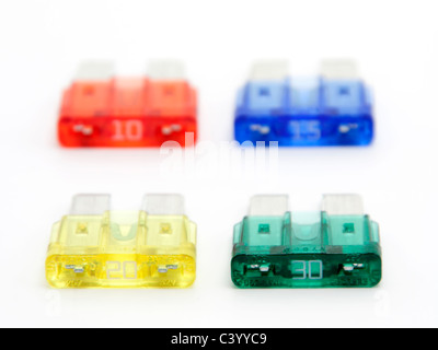 Colorful car fuses on white background Stock Photo
