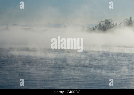 A cool early winter fog on the Fraser River. Port Coquitlam, BC, Canada. Stock Photo