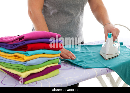 housewife is doing the ironing over white background Stock Photo
