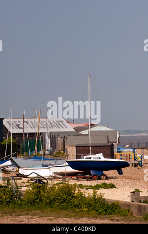 WHITSTABLE, KENT, UK - APRIL 30, 2011:  Boats pulled up on the beach Stock Photo