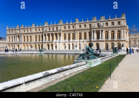 Bronze statues in garden of Versailles. The famous palace of the Sun King: Louis XIV. Stock Photo