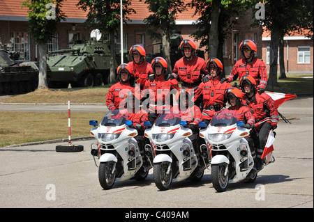 Demonstration of the Belgian Military Police on motorbikes during open day of the Belgian army at Leopoldsburg, Belgium Stock Photo