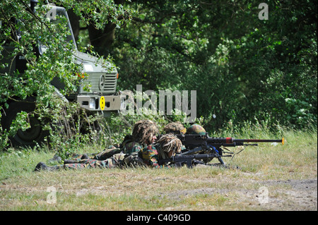 Demonstration of infantry soldiers firing Mi .50 machine gun during open day of the Belgian army at Leopoldsburg, Belgium Stock Photo