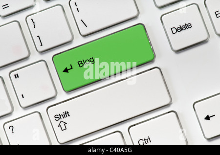 White keyboard buttons and green key blog Stock Photo