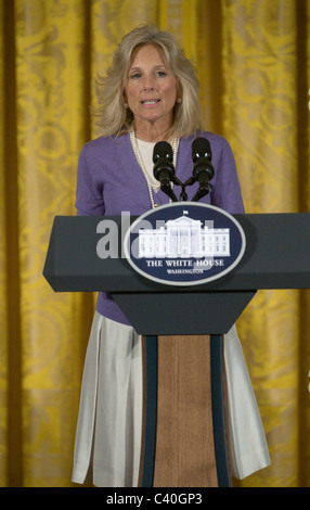 Dr. Jill Biden, wife of U.S. Vice President Joe Biden, speaks in the East Room of the White House. First lady Michelle Obama and Stock Photo