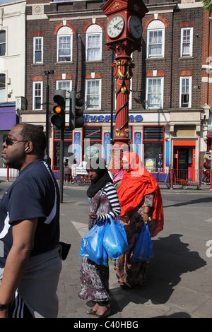 Harlesden, an area in London with one of the largest ethnic population particularly Afro-Caribbean. Jubilee clock tower is shown Stock Photo