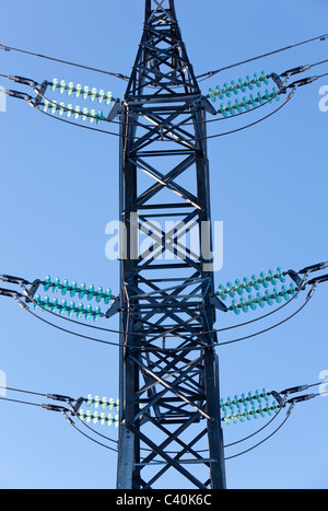 Glass insulators in a high-voltage power line , Finland Stock Photo