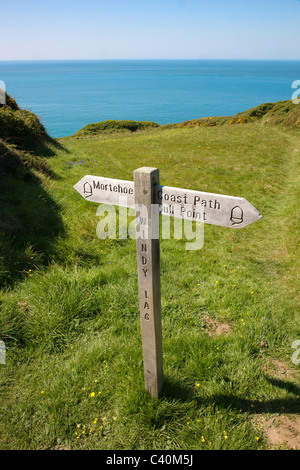 Waymarker on the South West coast path between  Morte Point and Bull point on the North Devon coast near Woolacombe and Mortehoe Stock Photo