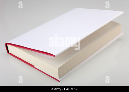 Hardcover book with white, plain cover Stock Photo