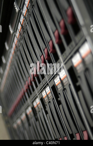 Hard drives in a row in a datacenter Stock Photo