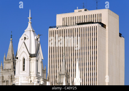 Assembly Hall & Salt Lake Temple inside Temple Square with world headquarters for Church of Jesus Christ of Latter-Day Saints Stock Photo