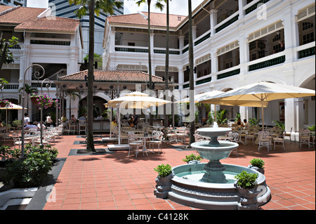 The Beautiful Courtyard Bar and Restaurant at Raffles Hotel in Republic of Singapore Asia Stock Photo