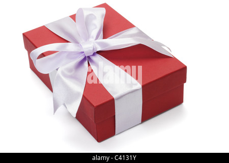 Red gift box with bow ribbon on white background Stock Photo