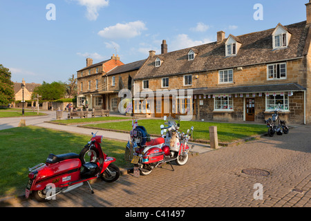 Old mod scooters parked for the night in the village of Broadway, The Cotswolds, Worcestershire, England, GB, UK, EU, Europe Stock Photo