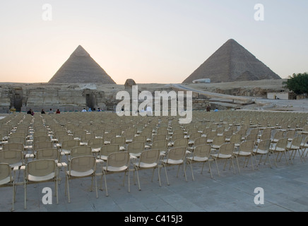Chairs waiting for tourists for the sound and light show at the Great Pyramids at Giza, Cairo Stock Photo