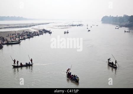 Boats with pilgrims cross Gandak river in Sonepur, Sonepur Mela in Sonepur near Patna in Bihar state, India. Stock Photo